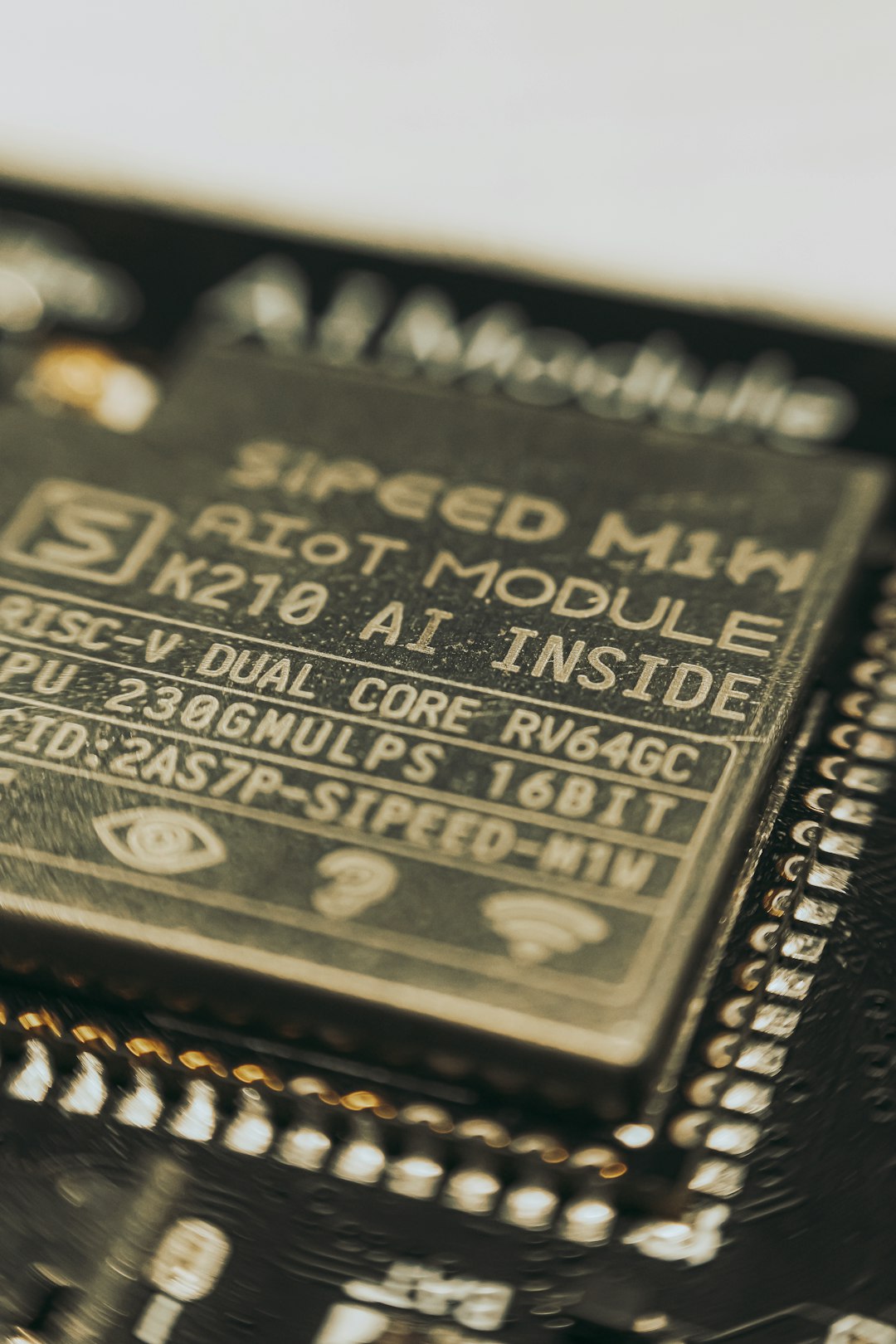 Close-up of an AI processor module, the kind of on-device silicon driving memory demand