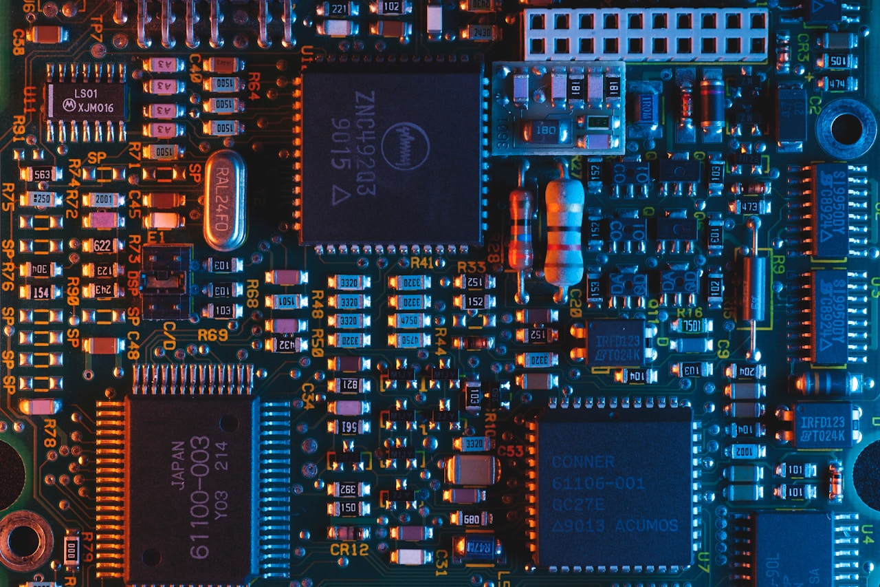 Close-up of a printed circuit board packed with chips and components