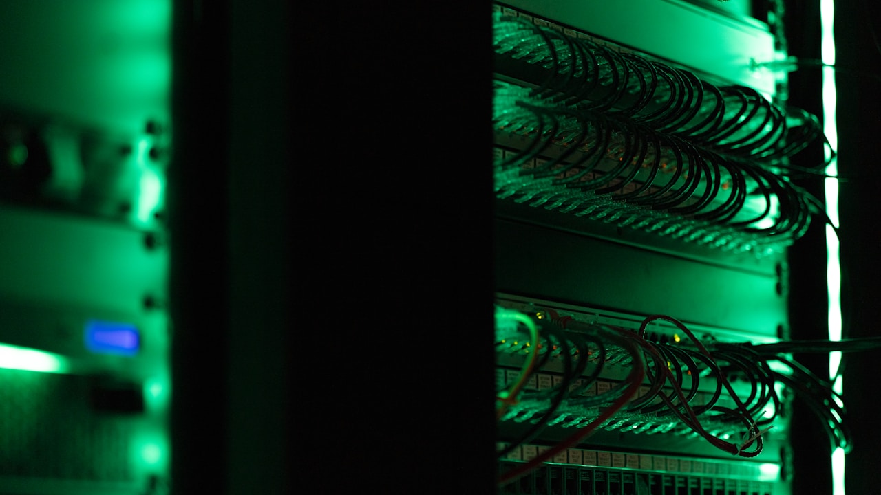 Rows of servers in a data centre, the compute infrastructure behind AI