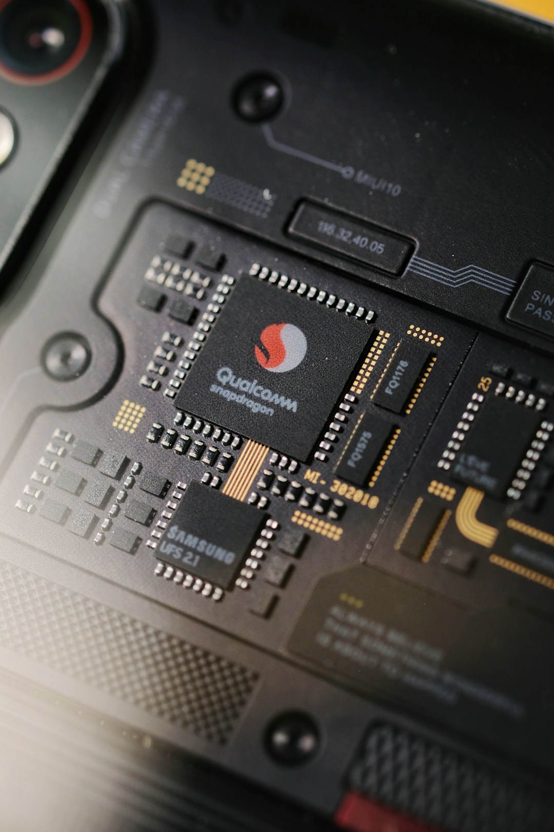 Close-up of a finished, packaged processor inside a smartphone, the stage of chipmaking Malaysia specialises in