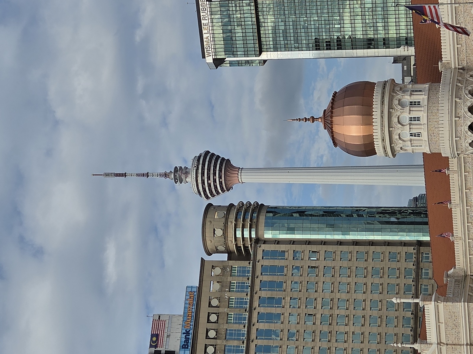 KL Tower and a copper dome compressed together at 4x on the Galaxy Z Fold8 KL Tower and a copper dome compressed together at 4x on the Galaxy Z Fold8