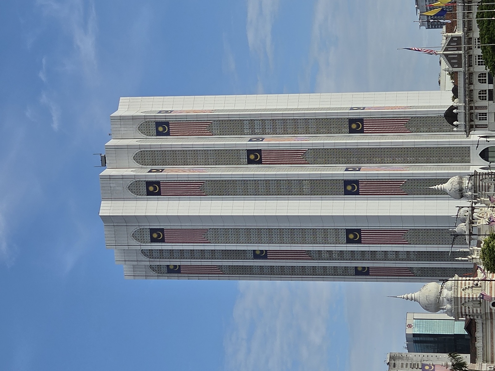 The white lattice facade of a Kuala Lumpur tower at 4x on the Galaxy Z Fold8 The white lattice facade of a Kuala Lumpur tower at 4x on the Galaxy Z Fold8