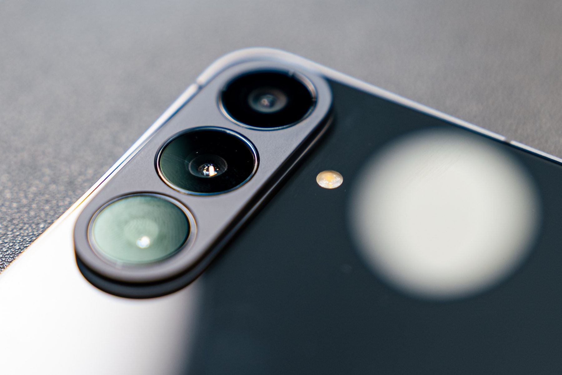 The triple camera island up close: 50MP main with optical stabilisation, 12MP ultra-wide, 8MP 3x telephoto. Photo by ProductNation. The triple camera island up close: 50MP main with optical stabilisation, 12MP ultra-wide, 8MP 3x telephoto. Photo by ProductNation.