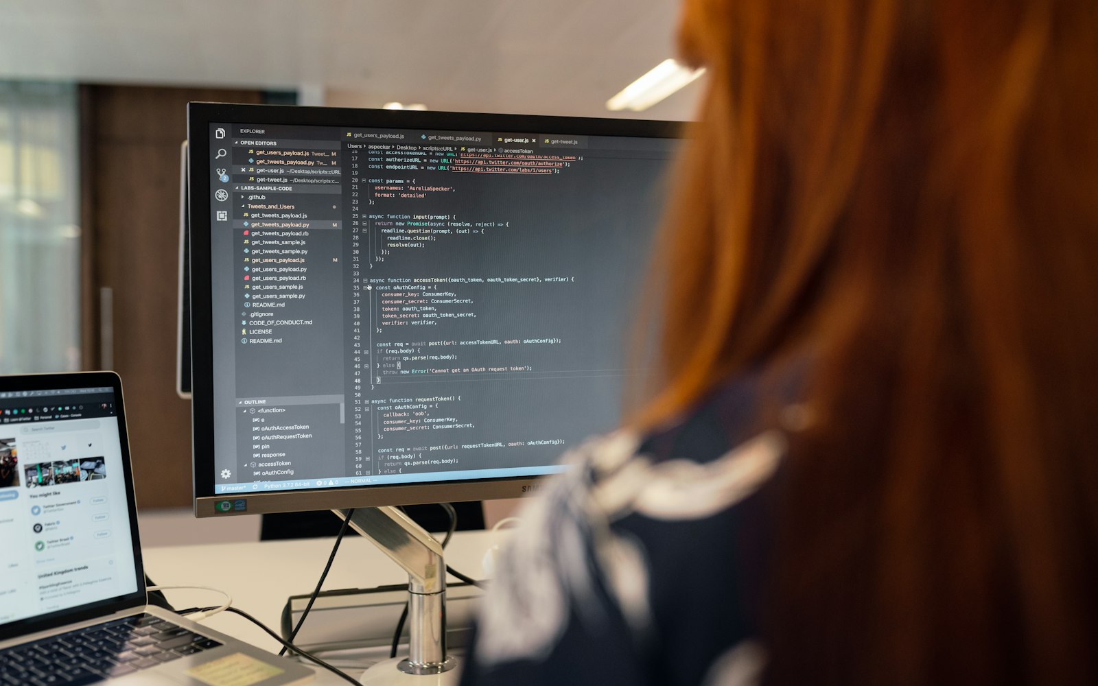 A software engineer writing code, the kind of AI development a dedicated Malaysian AI law would touch