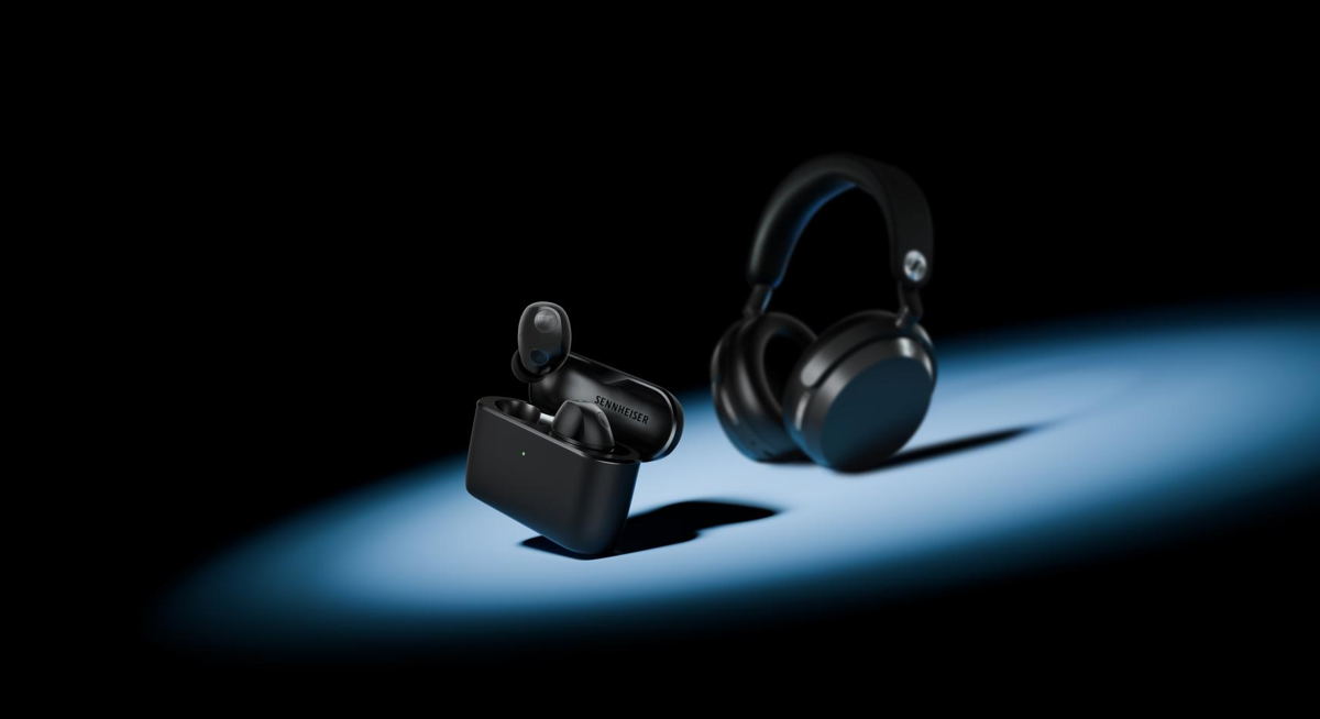 Sennheiser MOMENTUM True Wireless 5 earbuds with charging case beside the MOMENTUM 5 Wireless headphones