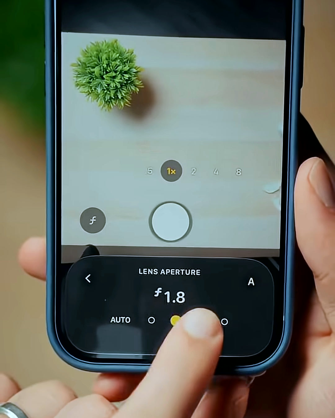 iPhone 18 Pro camera app open on the Lens Aperture control, set to f/1.8 iPhone 18 Pro camera app open on the Lens Aperture control, set to f/1.8