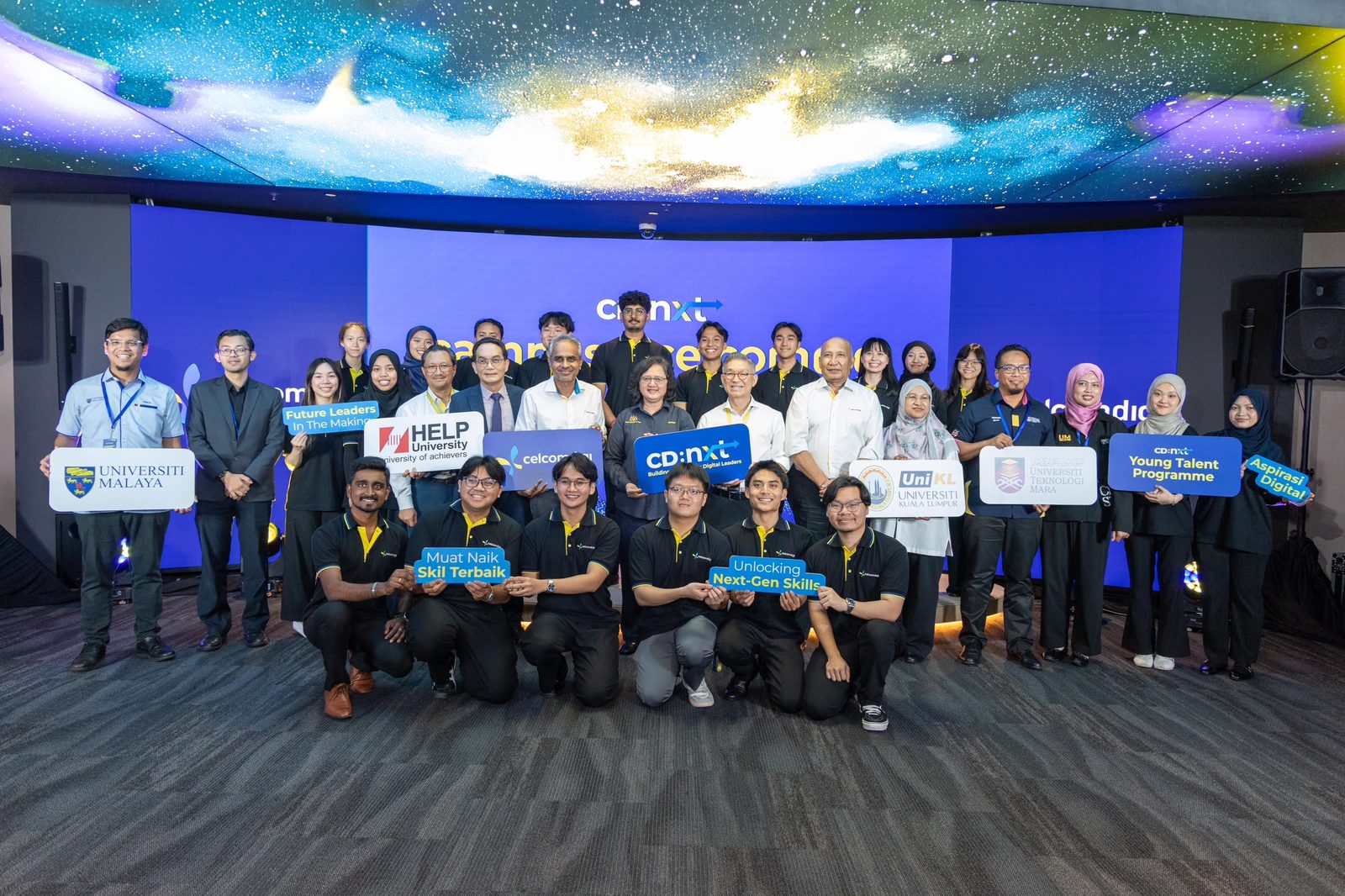 CelcomDigi CD:NXT launch group photo with representatives from Universiti Malaya, UiTM, UniKL and HELP University