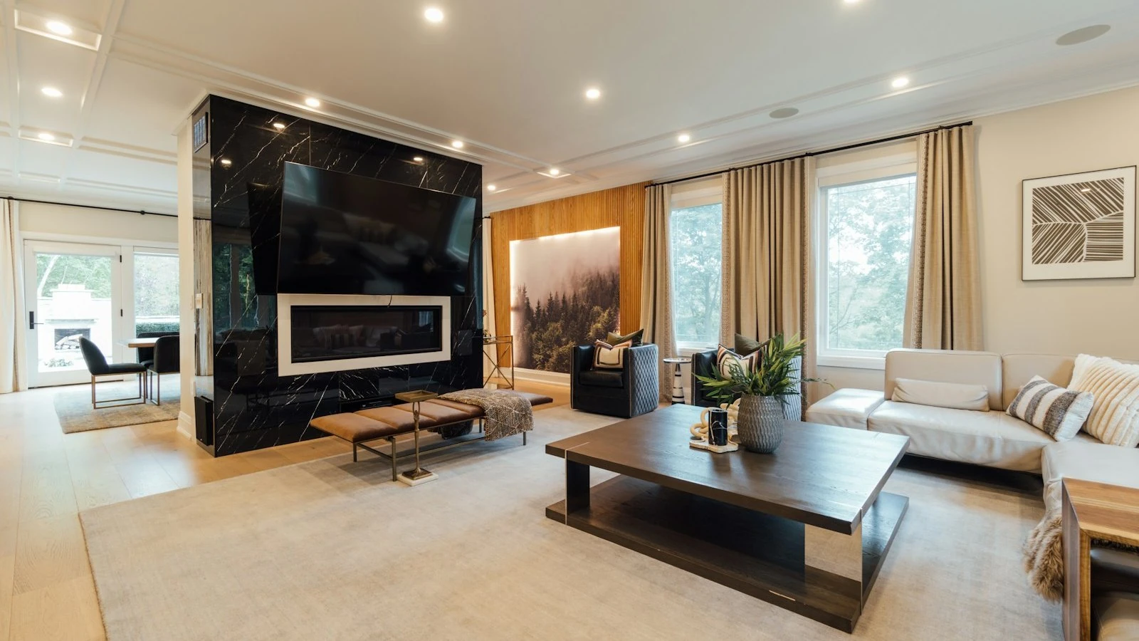 A wall-mounted flat-screen TV in a contemporary living room