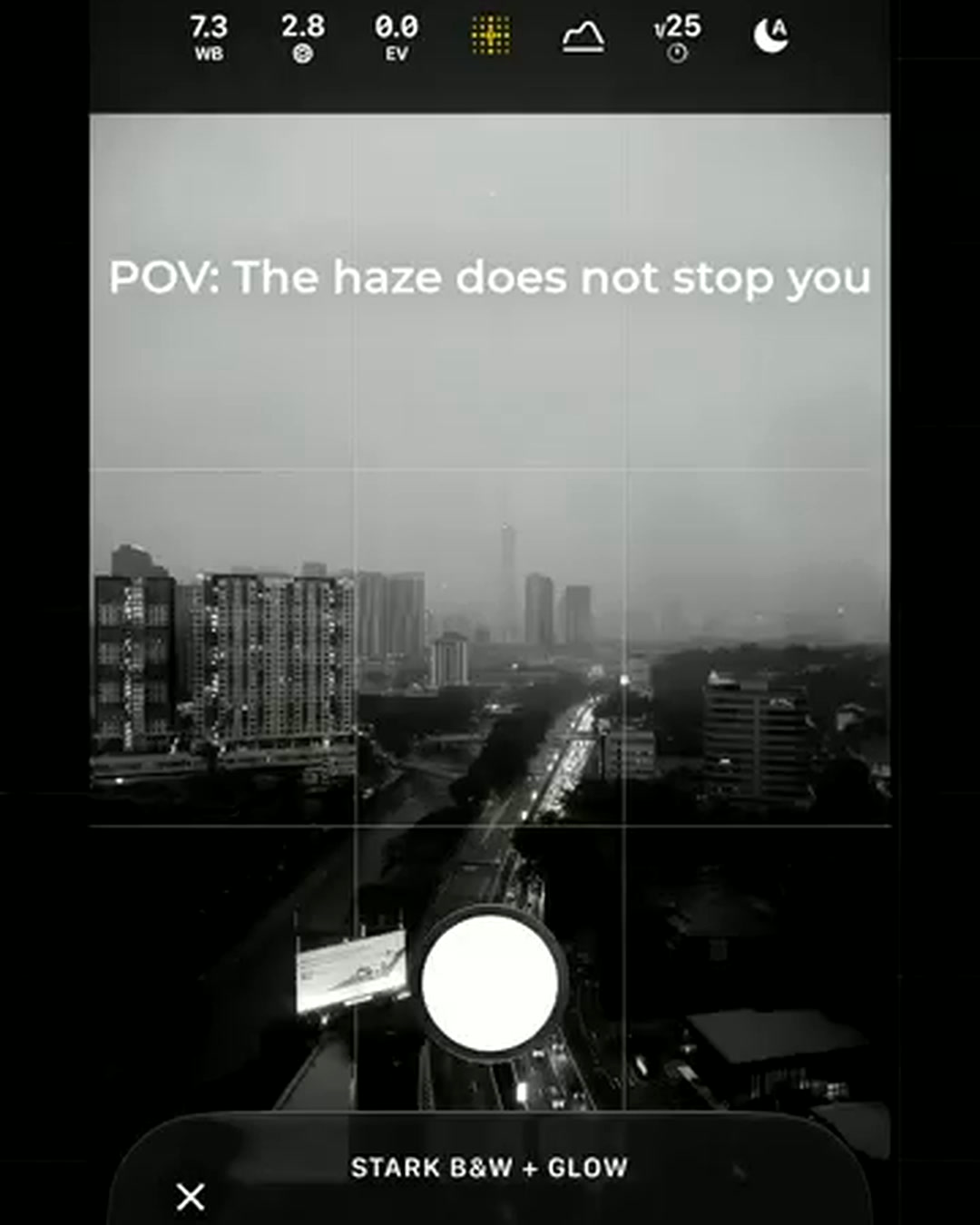 Kuala Lumpur skyline barely visible through haze, iPhone 18 Pro Camera app Stark B&W + Glow Photographic Style picker open Kuala Lumpur skyline barely visible through haze, iPhone 18 Pro Camera app Stark B&W + Glow Photographic Style picker open