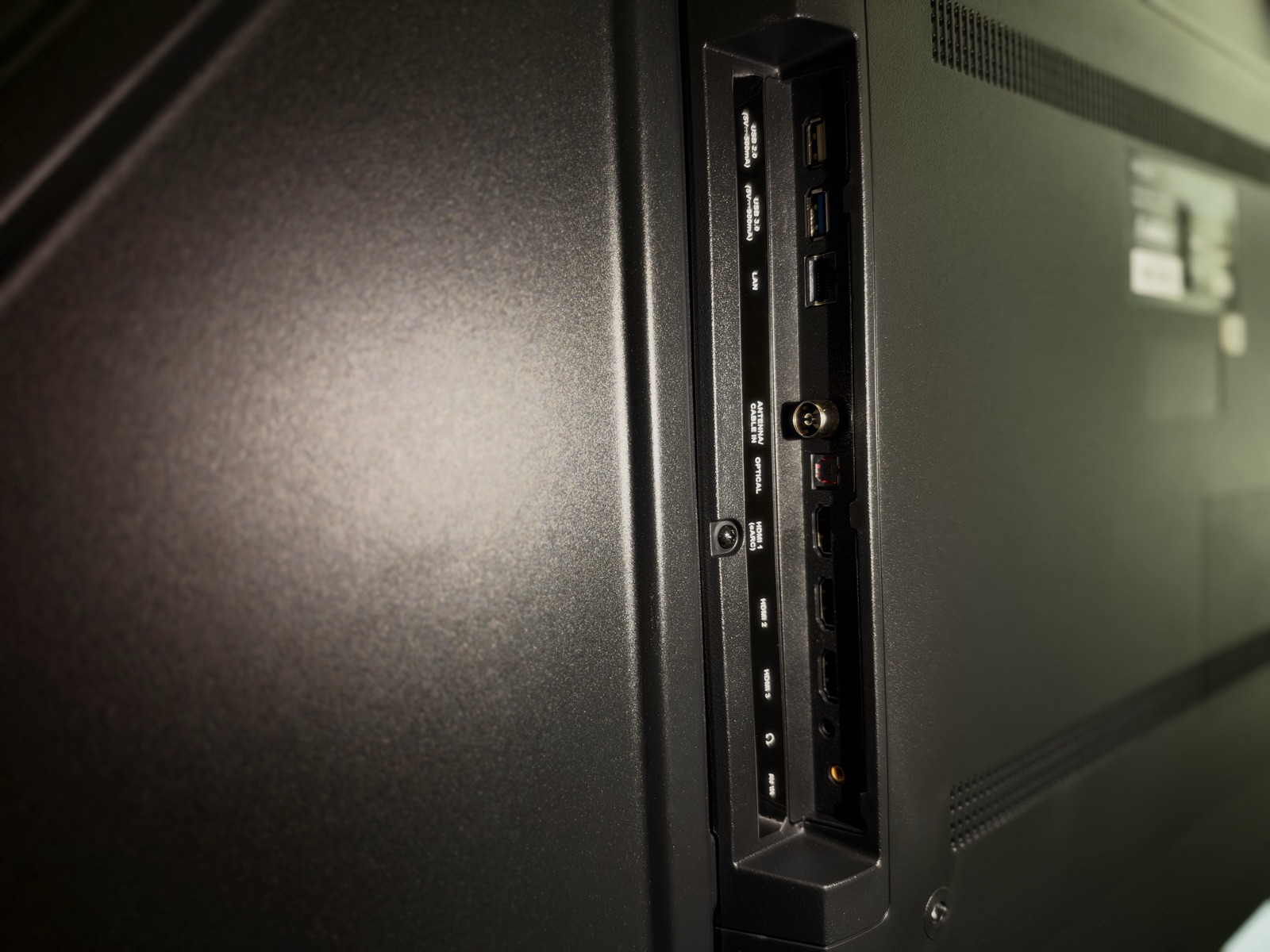 PRISM+ Q65 Ultra side-facing ports with HDMI 1 marked eARC