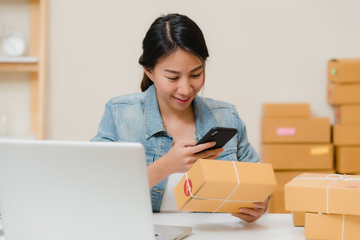 Small business owner checking an online order