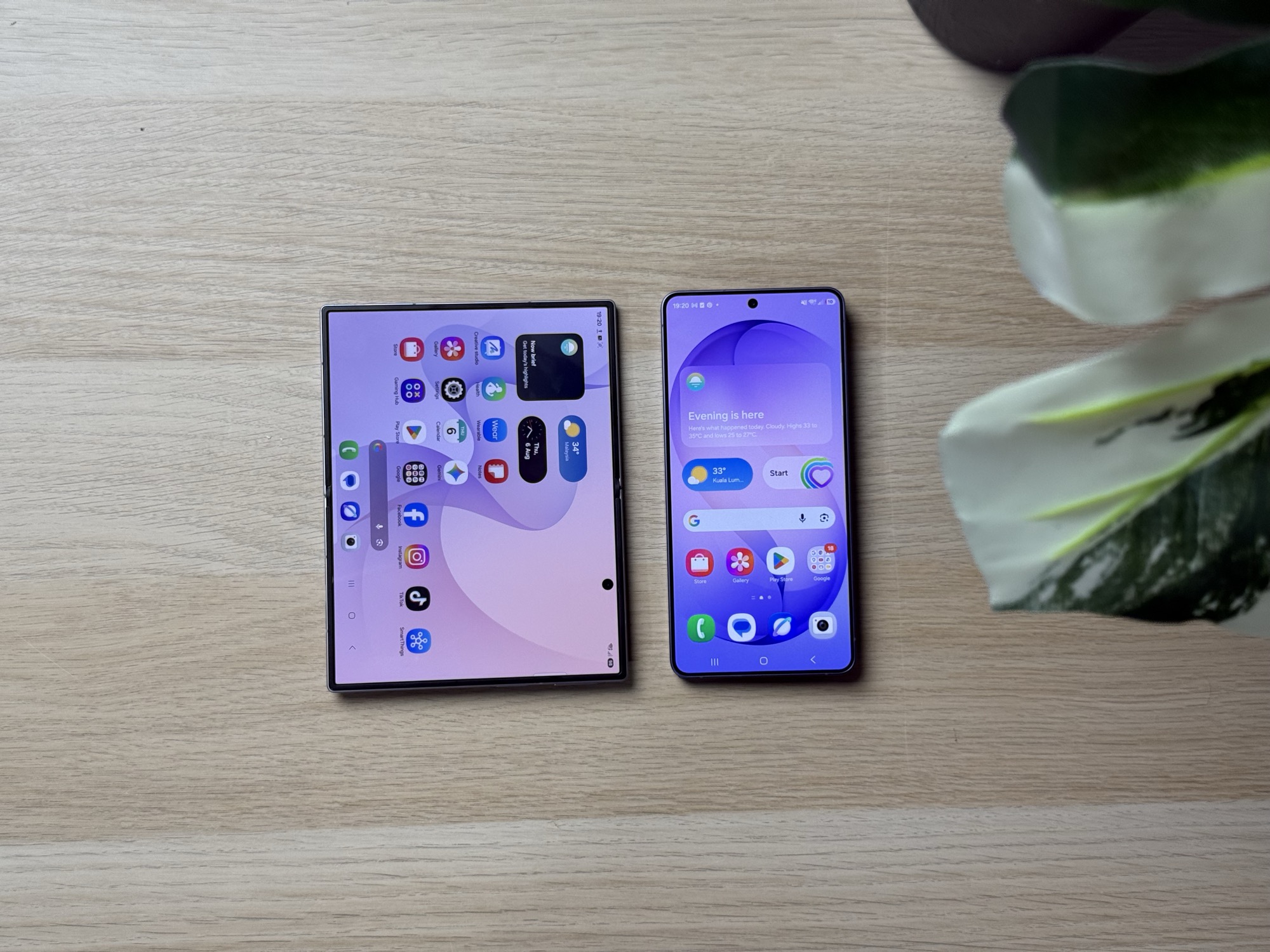 The Galaxy Z Fold8 open beside a Galaxy S26 Ultra, both screens on