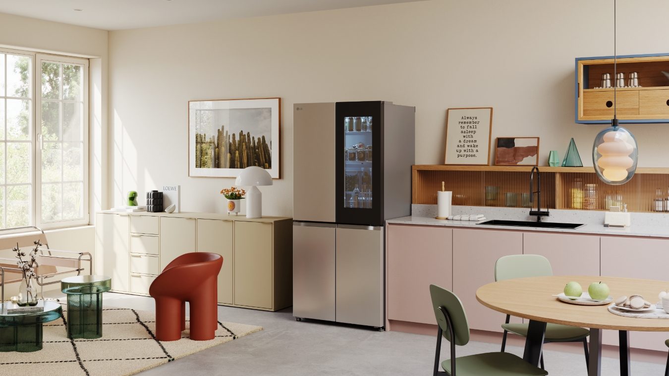 LG InstaView refrigerator in a bright kitchen, its glass panel lighting up on a double knock