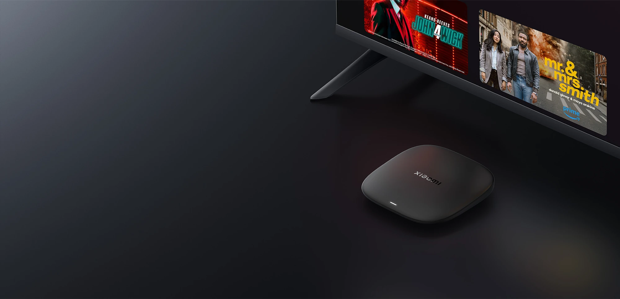 Xiaomi TV Box S 3rd Gen on a media console under a TV