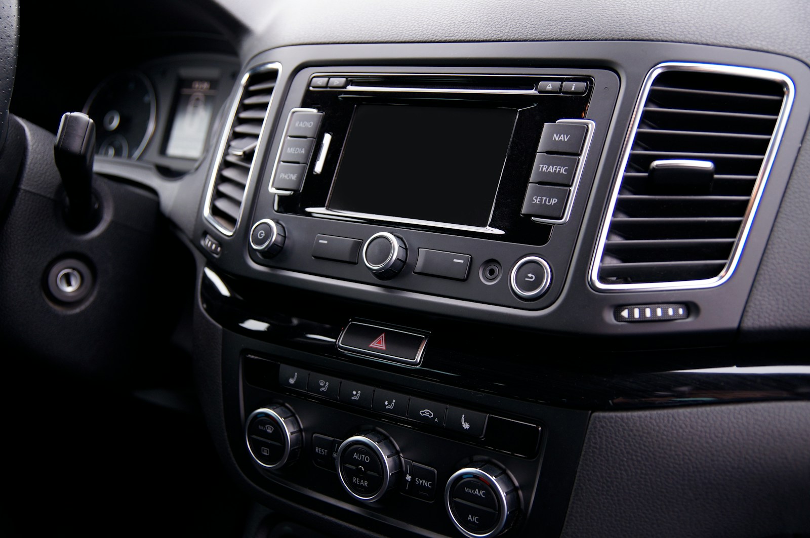 A car centre-console infotainment screen with navigation, media and setup controls, the surface where a connected car generates and shares its data