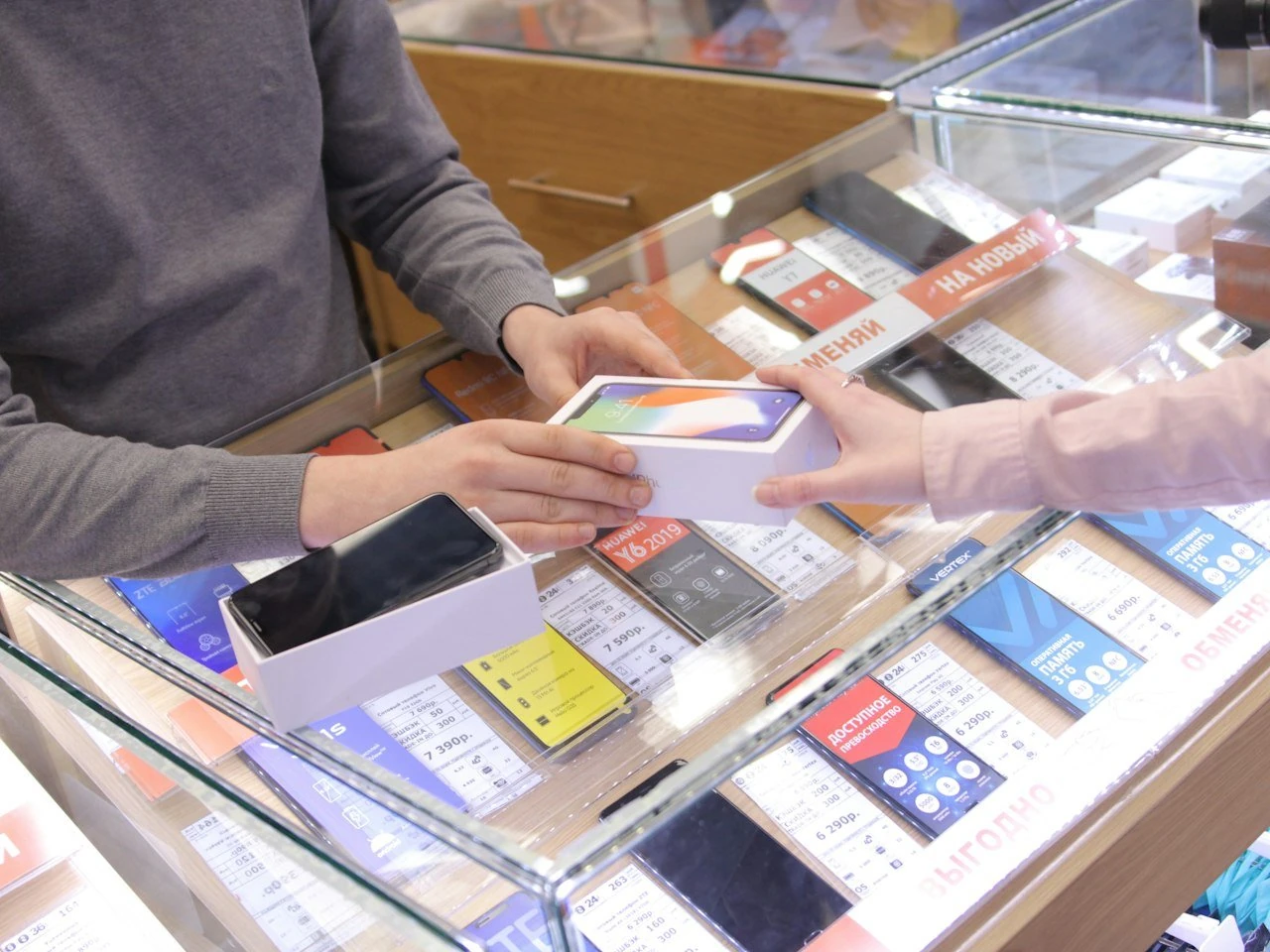 Entry-level smartphones on display in a phone store