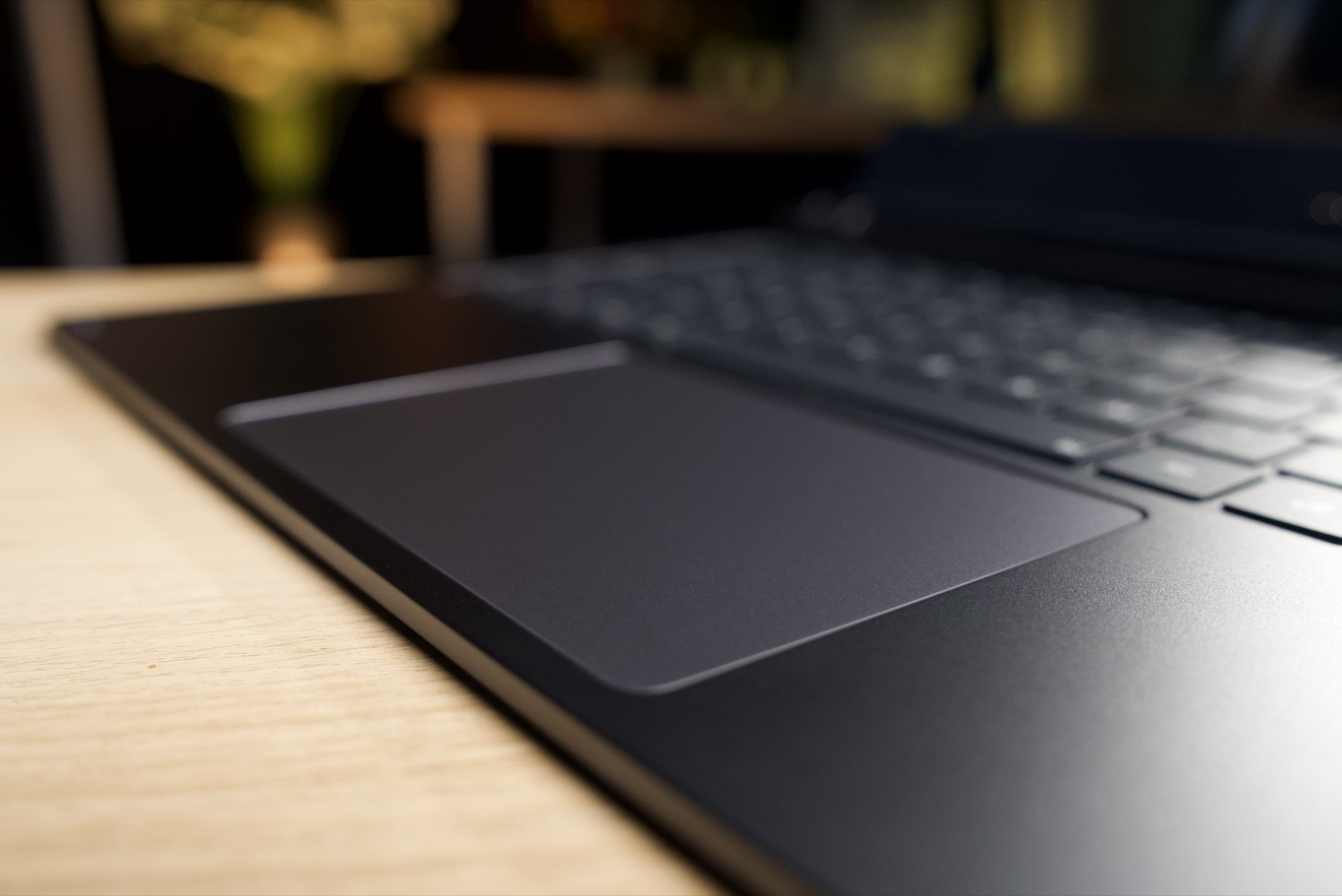 Low-angle close-up of the Pro Keyboard's trackpad
