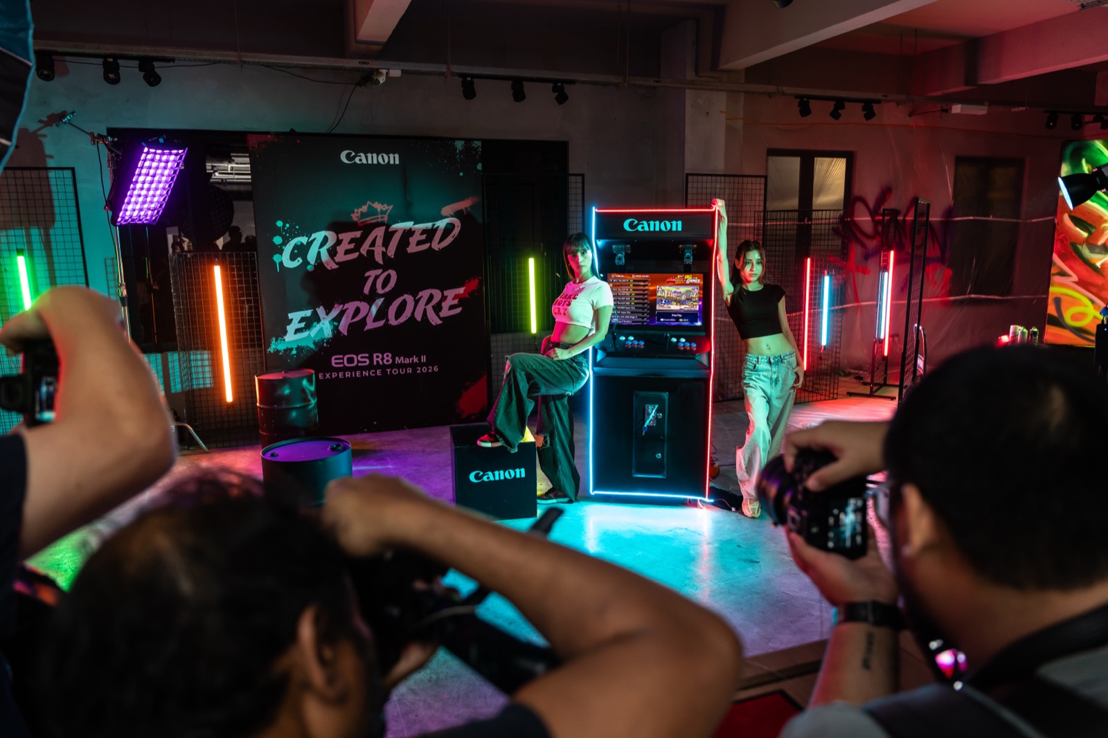 Photographers shooting a model portrait scene with the EOS R8 Mark II at the Kuala Lumpur Experience Tour