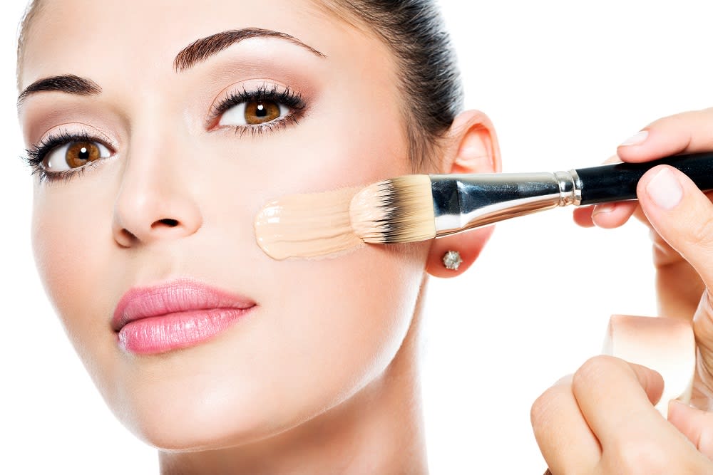 makeup-artist-applying-liquid-tonal-foundation-face-woman.jpg