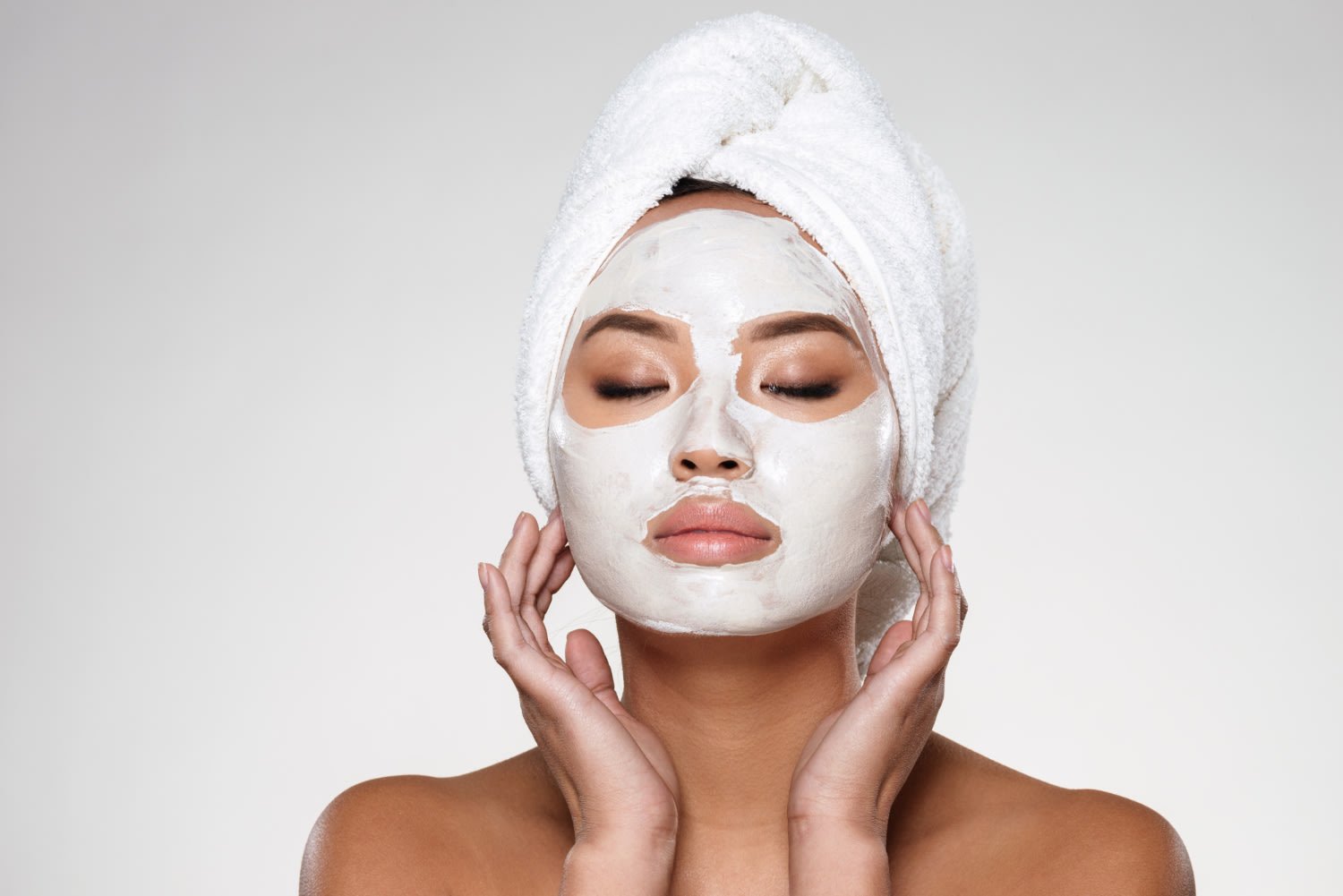 woman-using-face-mask-scrub.jpg