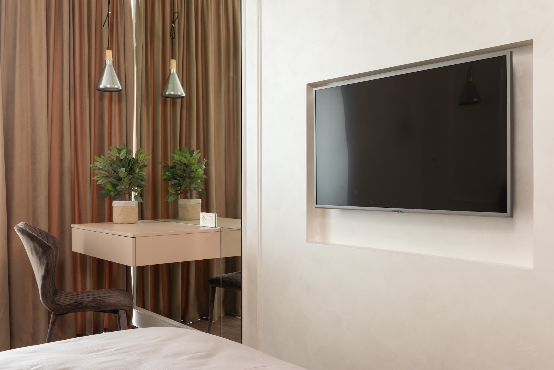 ilustrasi sebuah smart TV di kamar